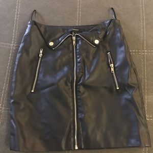 Black leather mini skirt